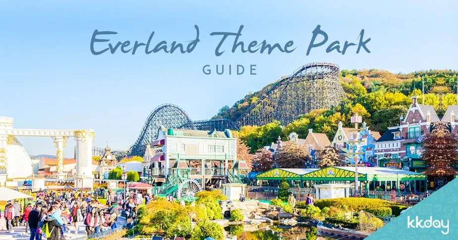 A scenic view of Everland Theme Park featuring a large wooden roller coaster built into a forested hill, colorful European-style buildings, gardens, and visitors, with text reading "Everland Theme Park GUIDE" overlaid at the top.