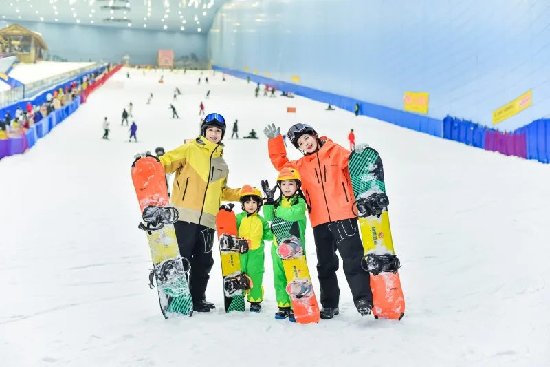 Family snowboarding at Guangzhou Bonski indoor ski resort