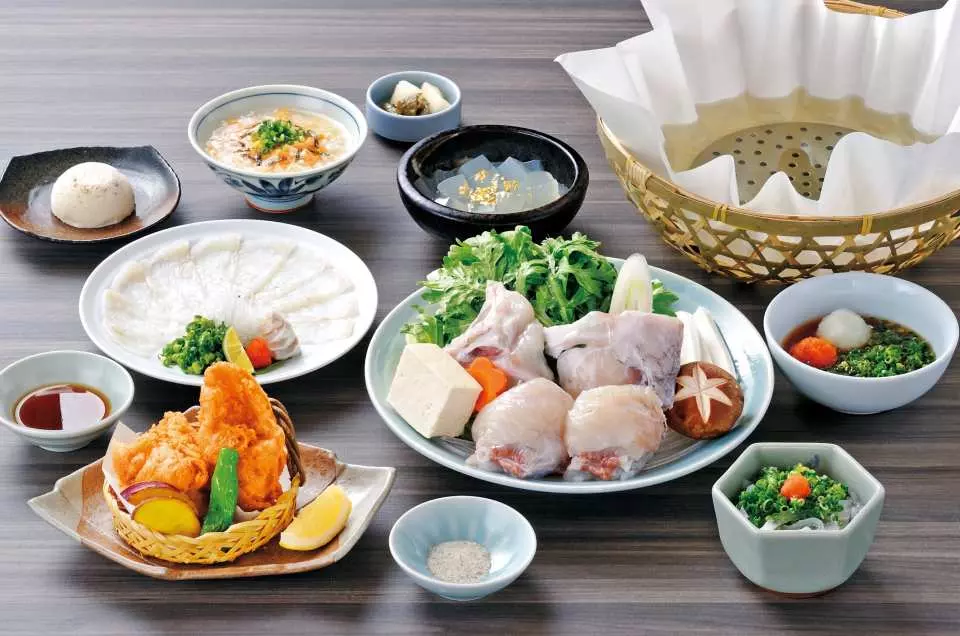 Traditional pufferfish hot pot meal in Osaka