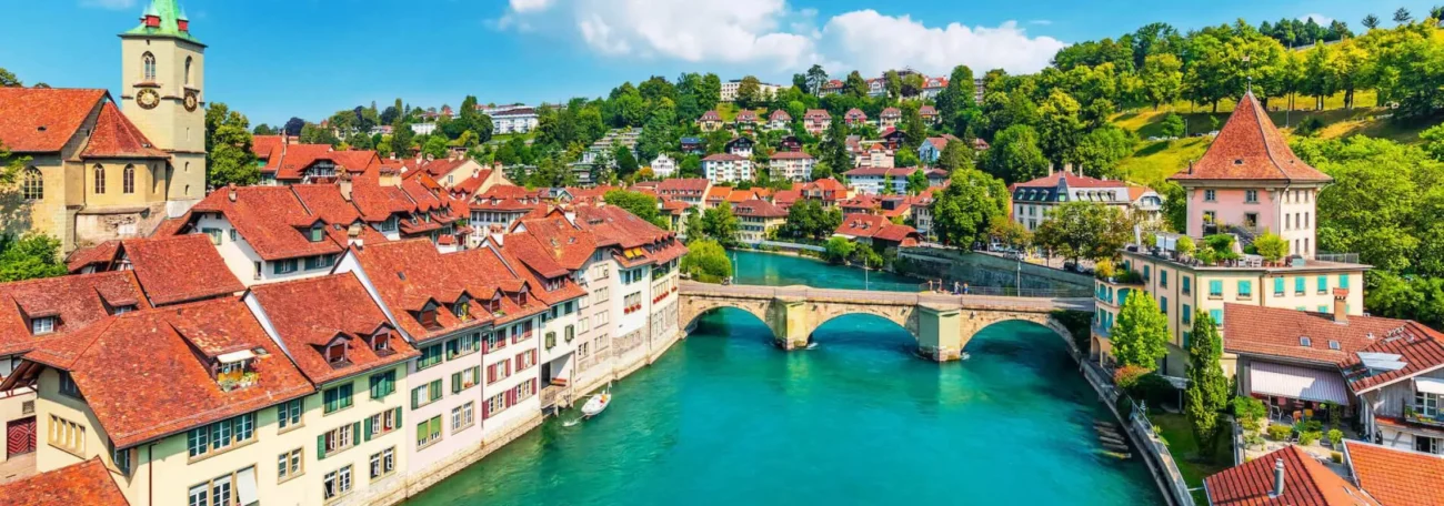 Bern old town river bridge red roofs Switzerland travel guide