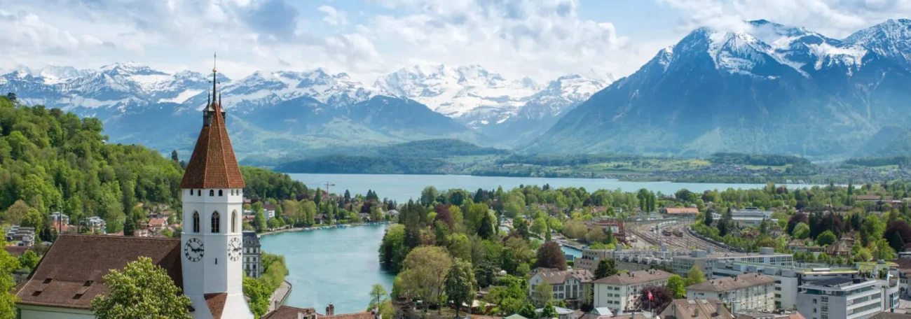 Lucerne lake mountains skyline church tower Switzerland travel guide